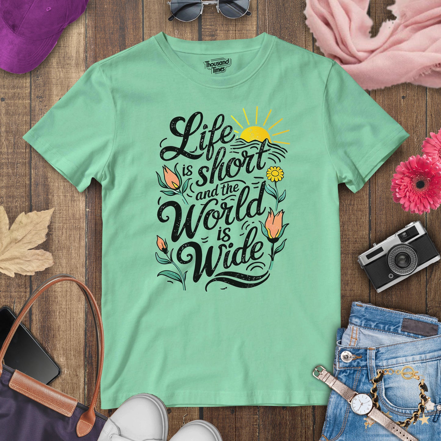 "Life is short and the world is wide" women's T-Shirt