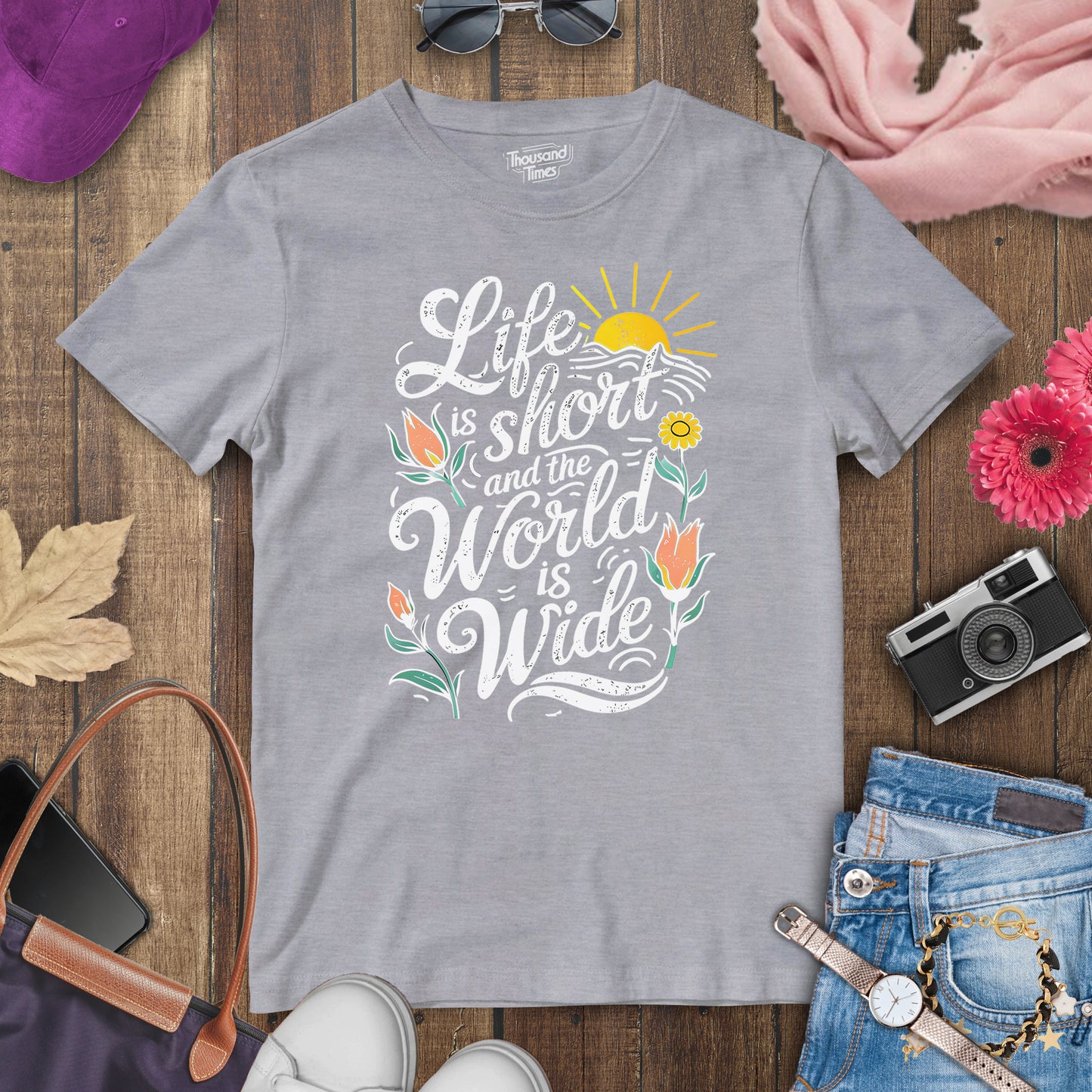 "Life is short and the world is wide" women's T-Shirt