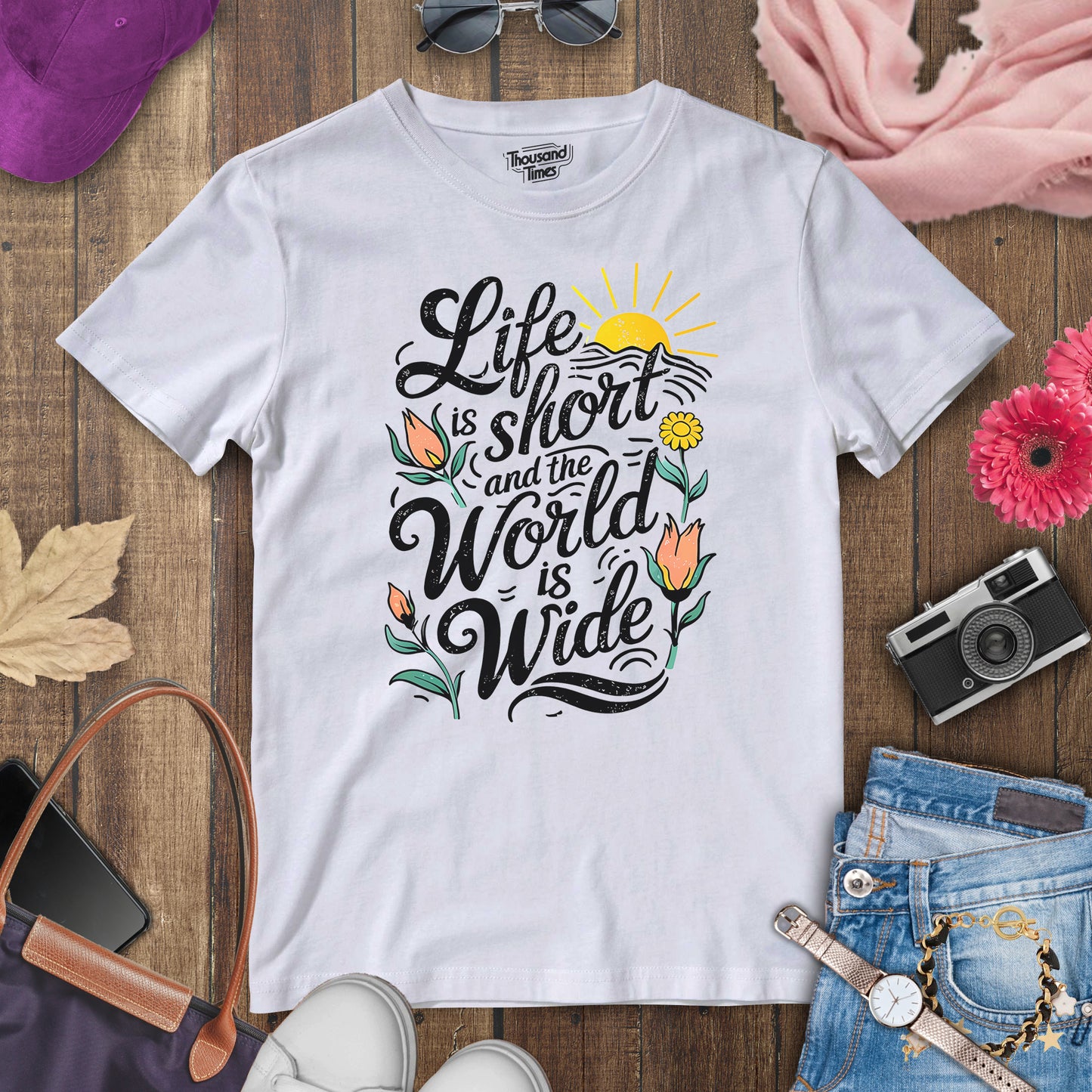 "Life is short and the world is wide" women's T-Shirt