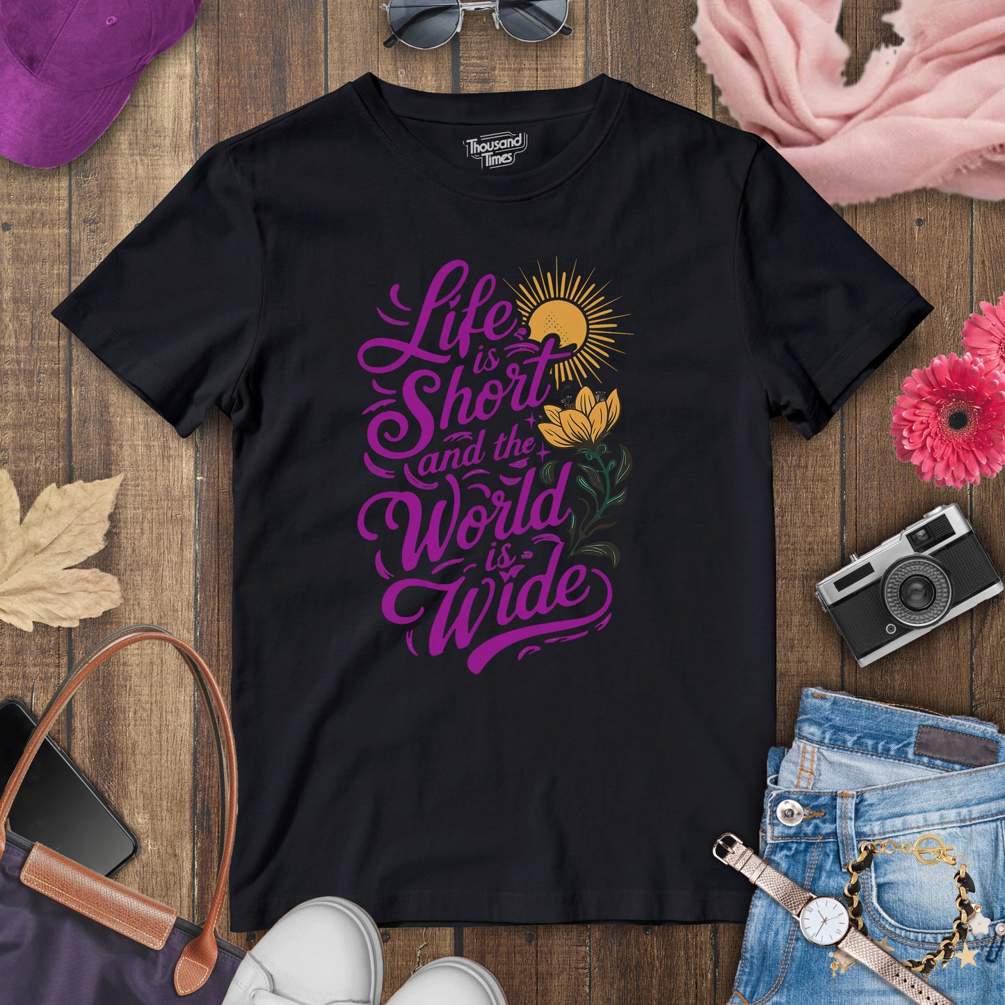 "Life is short and the world is wide" women's T-Shirt