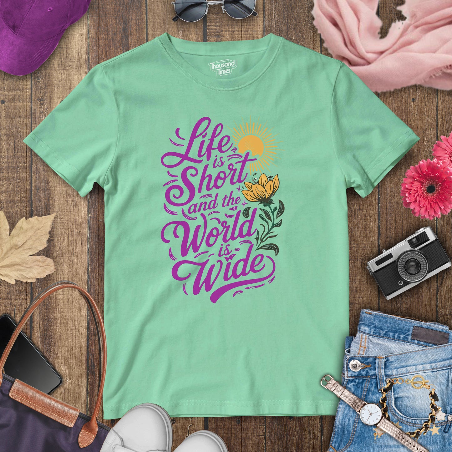 "Life is short and the world is wide" women's T-Shirt