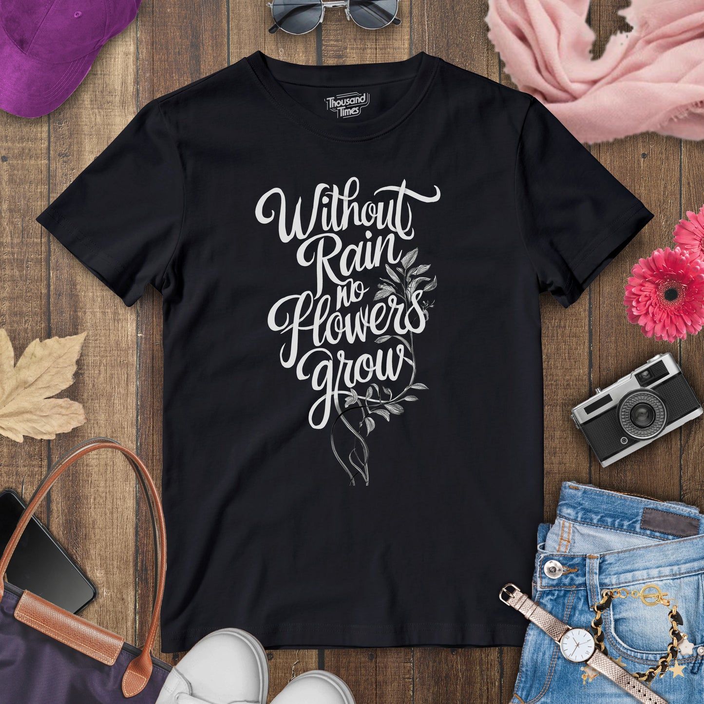 "Without rain no flowers grow" women's T-Shirt