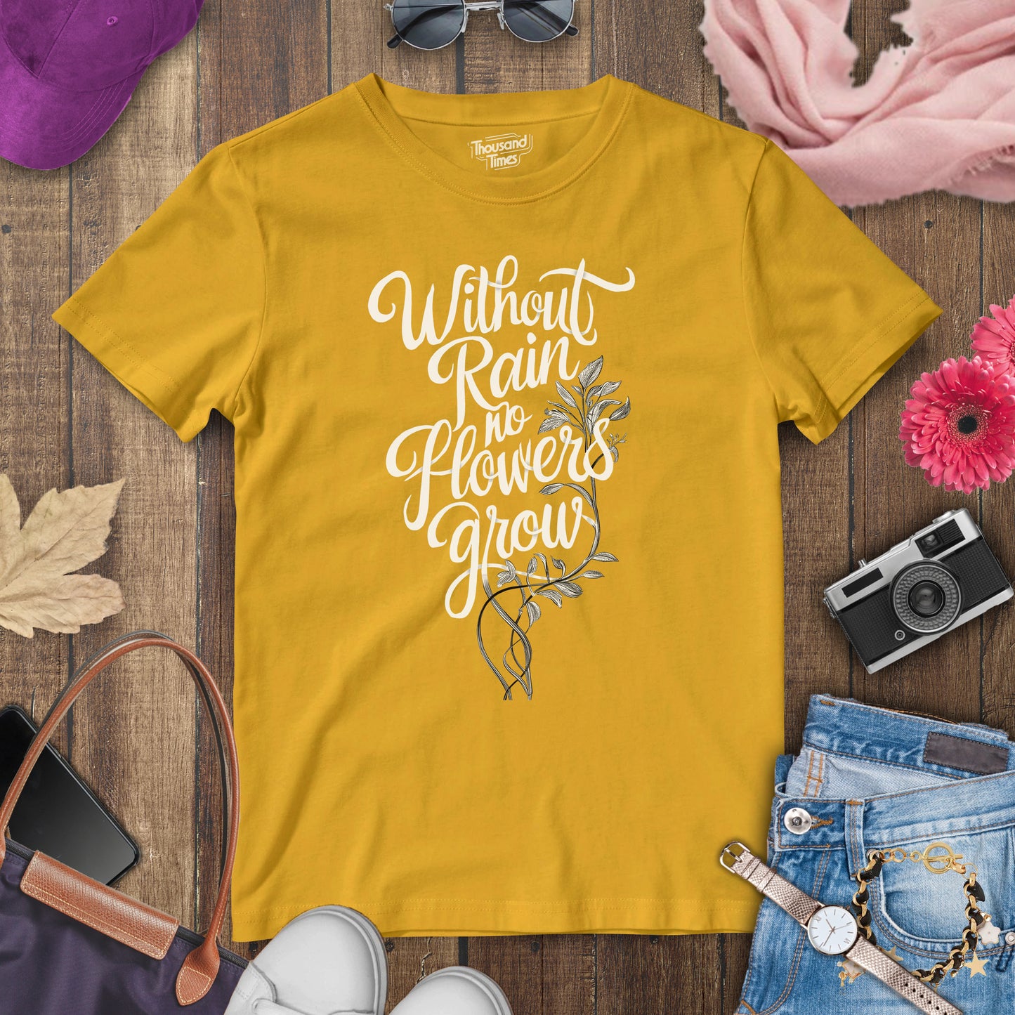 "Without rain no flowers grow" women's T-Shirt