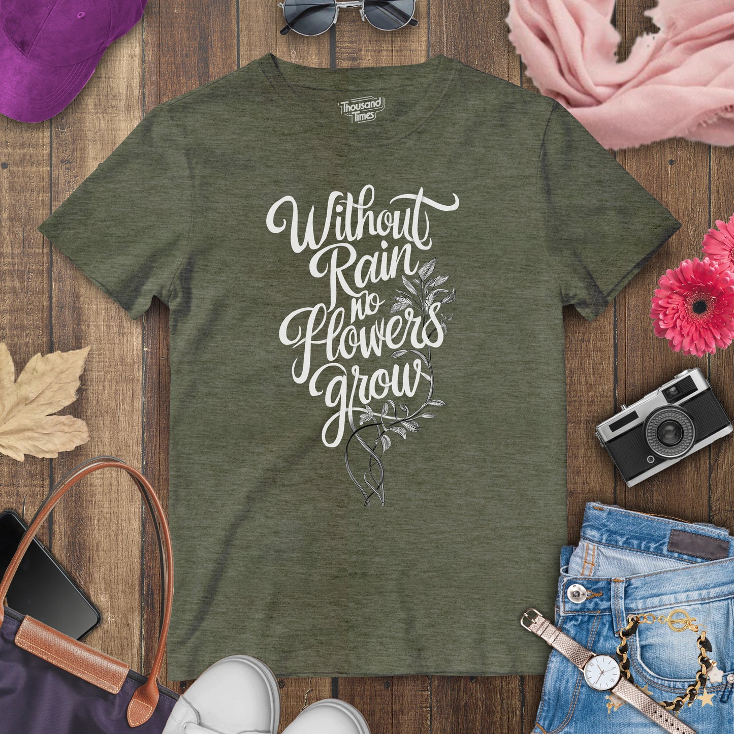 "Without rain no flowers grow" women's T-Shirt