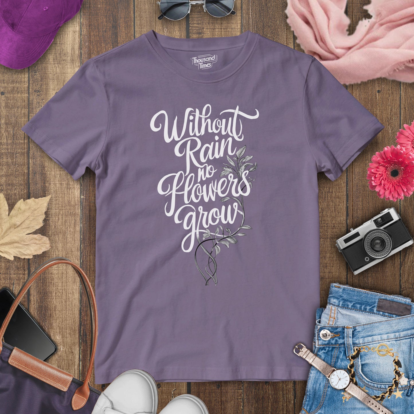 "Without rain no flowers grow" women's T-Shirt