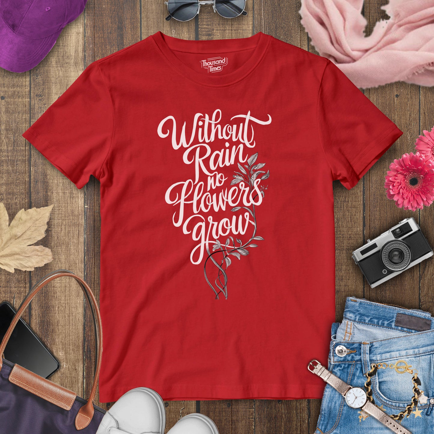 "Without rain no flowers grow" women's T-Shirt