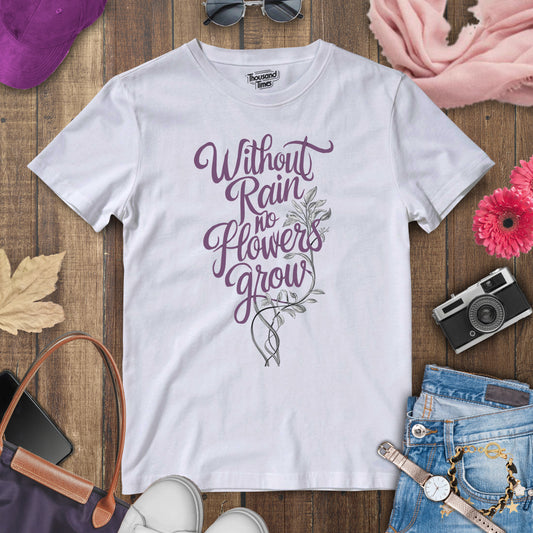 "Without rain no flowers grow" women's T-Shirt